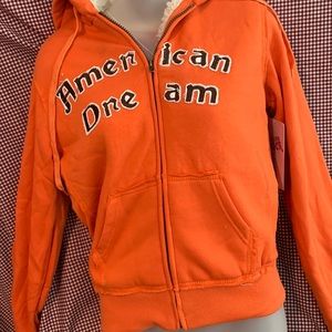 Beautiful sweater for men is orange